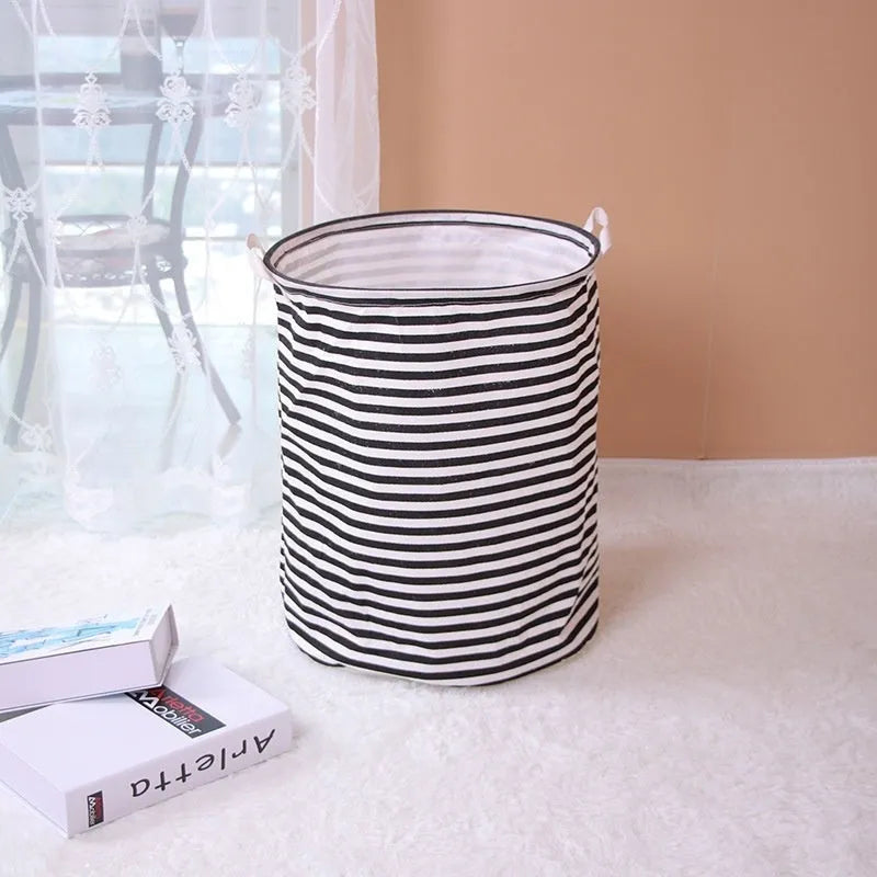 Striped cotton and linen storage basket, 40 x 50cm, with double handles, shown in black or red for laundry, toys or household use.