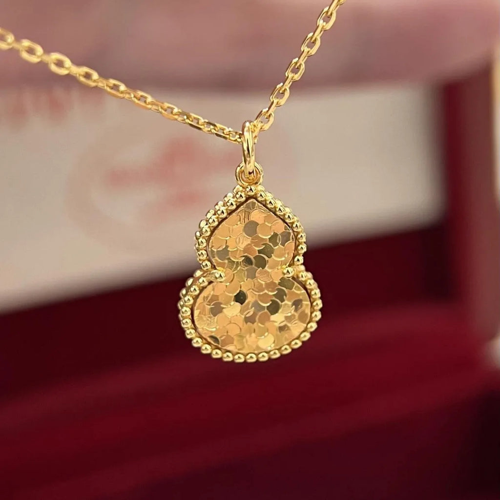 Gourd double-sided clavicle chain necklace in gold and silver options on display
