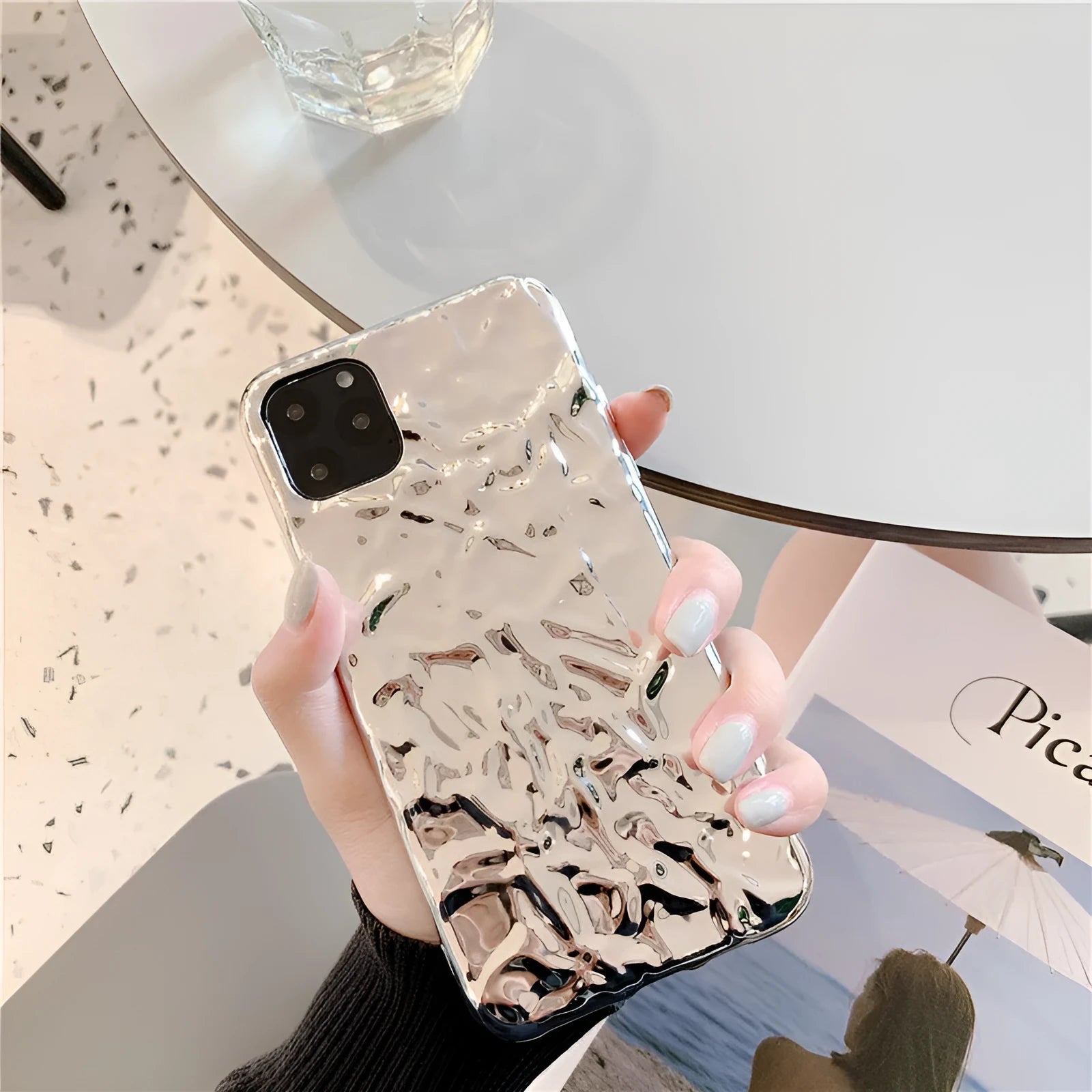 Folded rose gold electroplated TPU back cover case for an iPhone 15 Pro