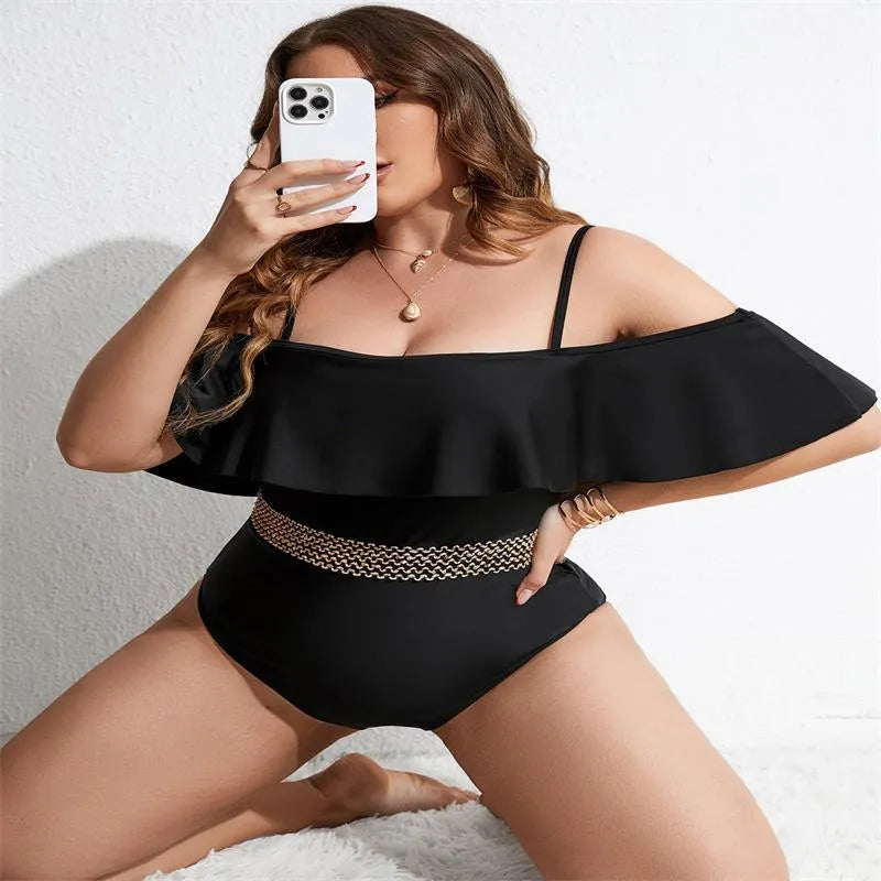 Black women's one-piece swimsuit on a mannequin, shown from the front.