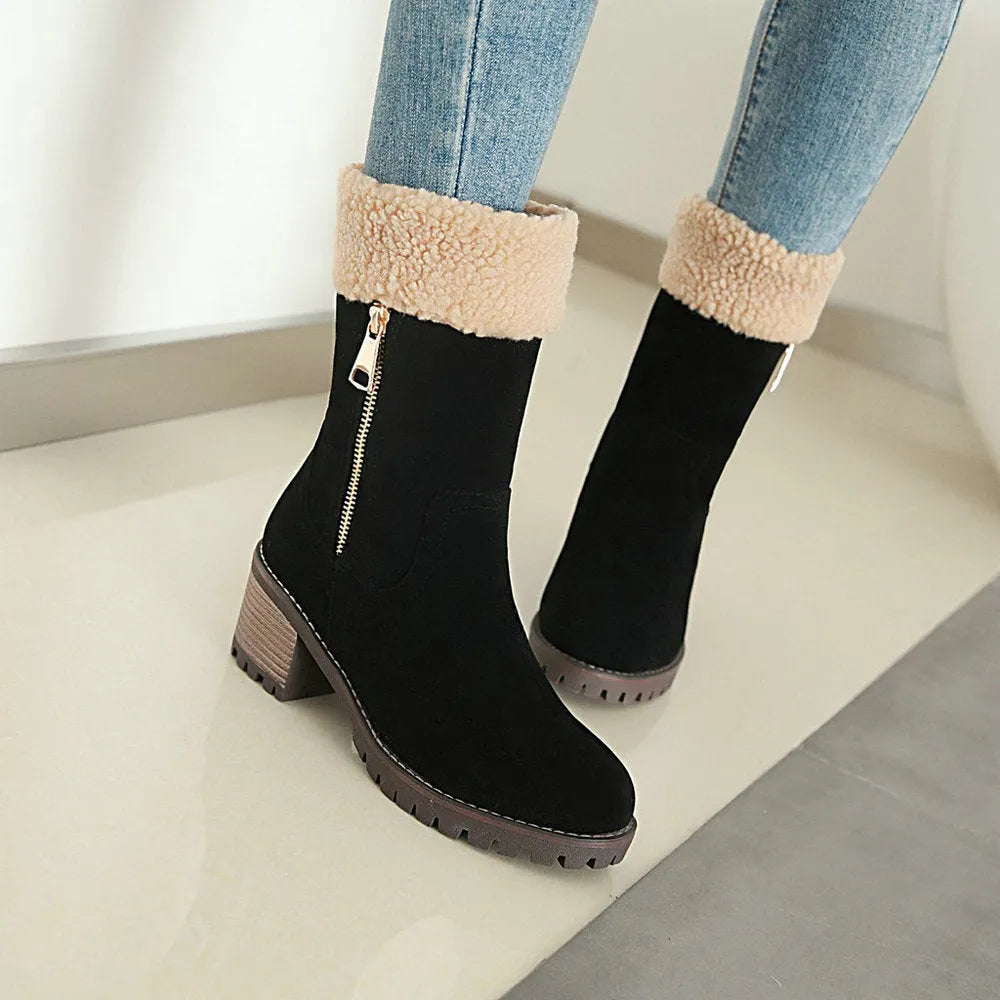Pair of unisex winter snow boots with a rubber sole and plush lining in one of four available colours.