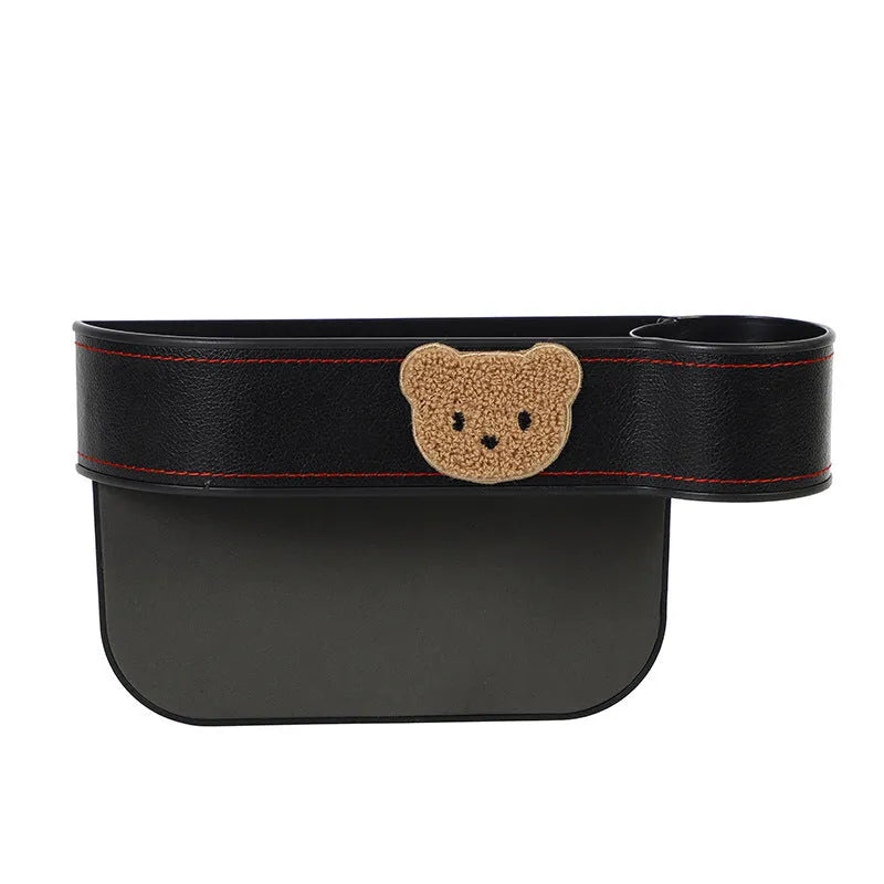 Car seat gap storage box with cartoon bear design made from leather