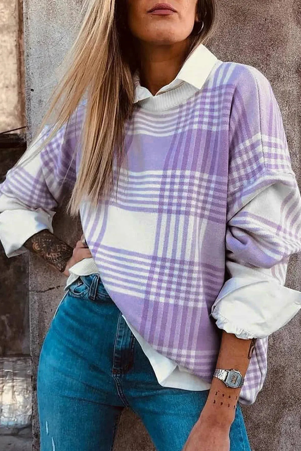 Lilac plaid print loose-fitting women's sweater with long sleeves and ribbed trim.