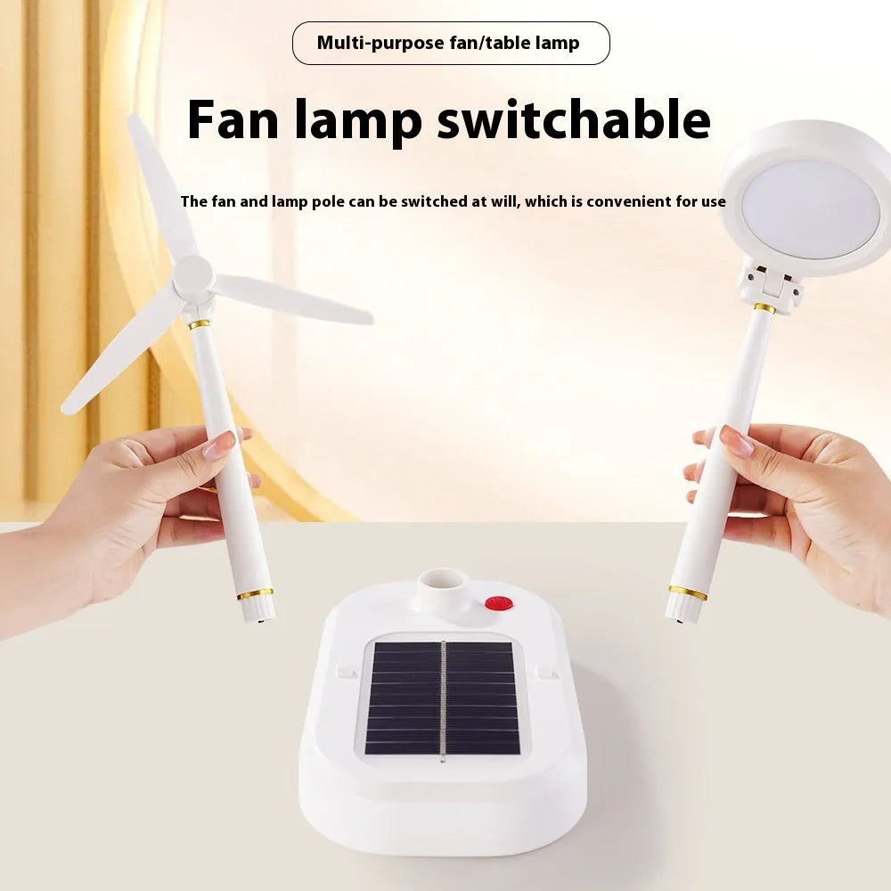 Ivory white solar charging table fan with integrated LED study lamp on a desk