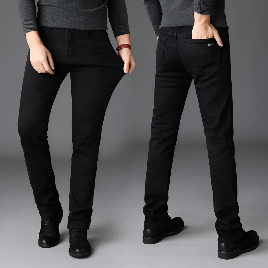 Men's slim straight black jeans made of cotton denim, flat lay