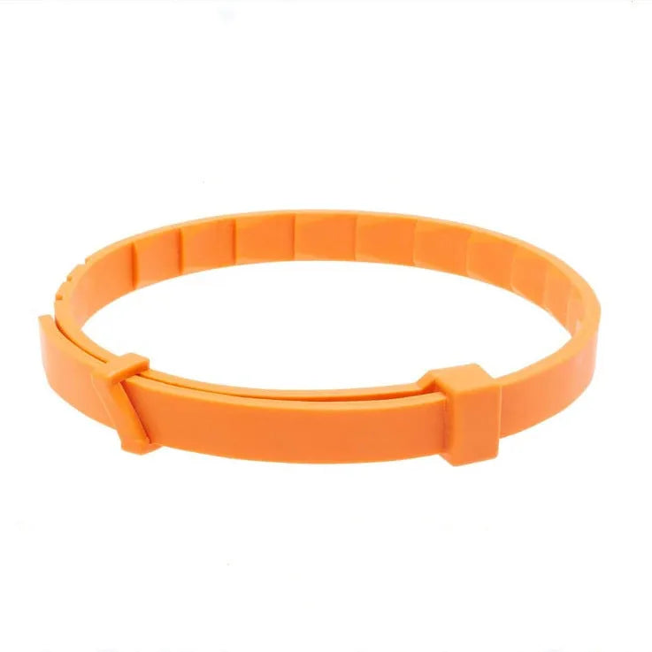 Rose Red plastic anti-flea pet collar for cats and dogs on a plain background