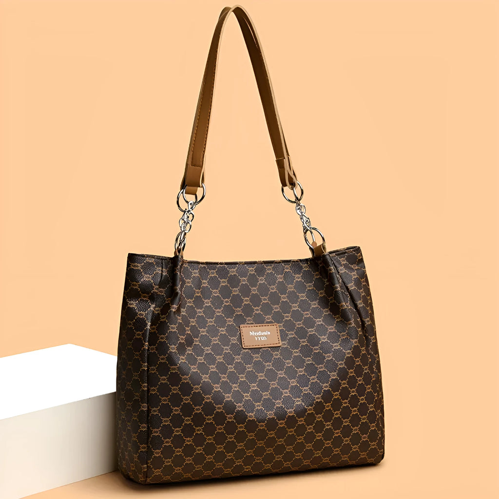 A brown retro-style women's PU leather handbag with a single strap and polyester lining.