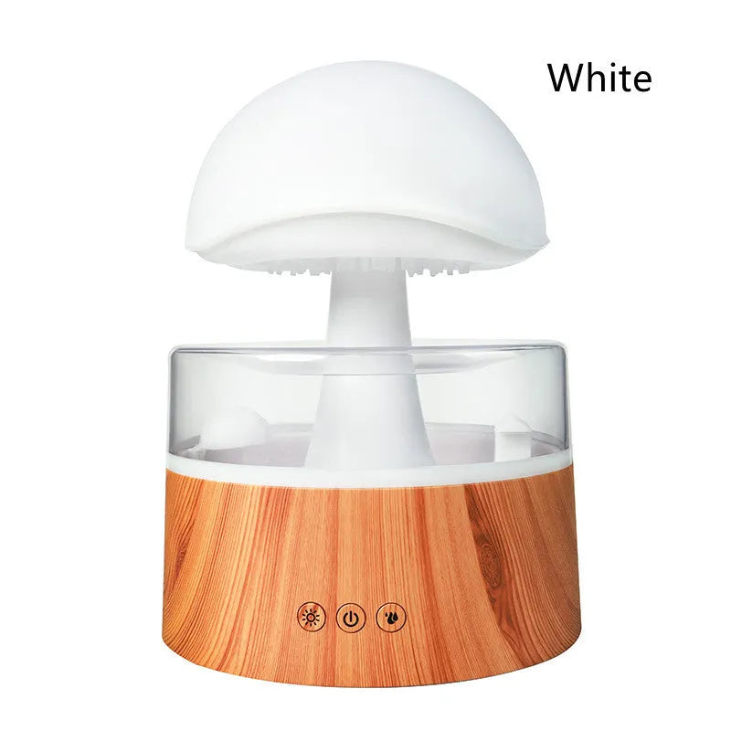 White cloud-shaped humidifier with falling raindrops and colour-changing night light
