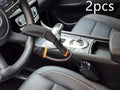 A red iron steering wheel lock with a copper core for General Motors cars, shown with its wire rope extended.