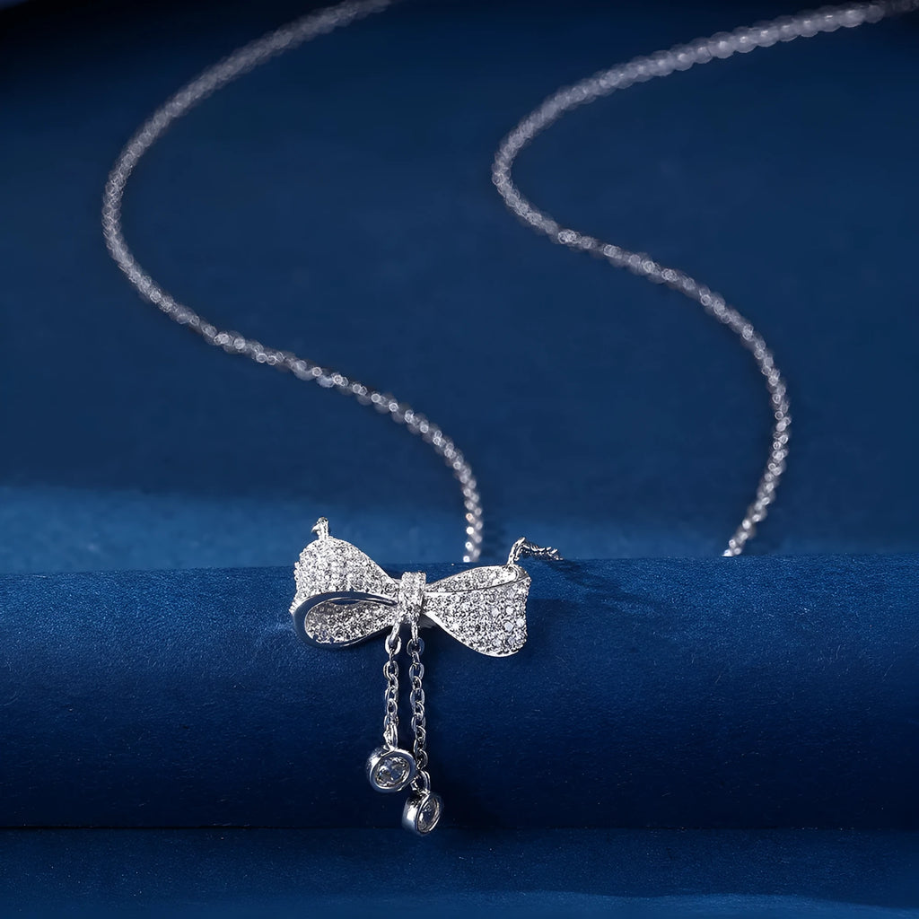 S925 sterling silver bow pendant necklace on O-ring chain, silver colour
