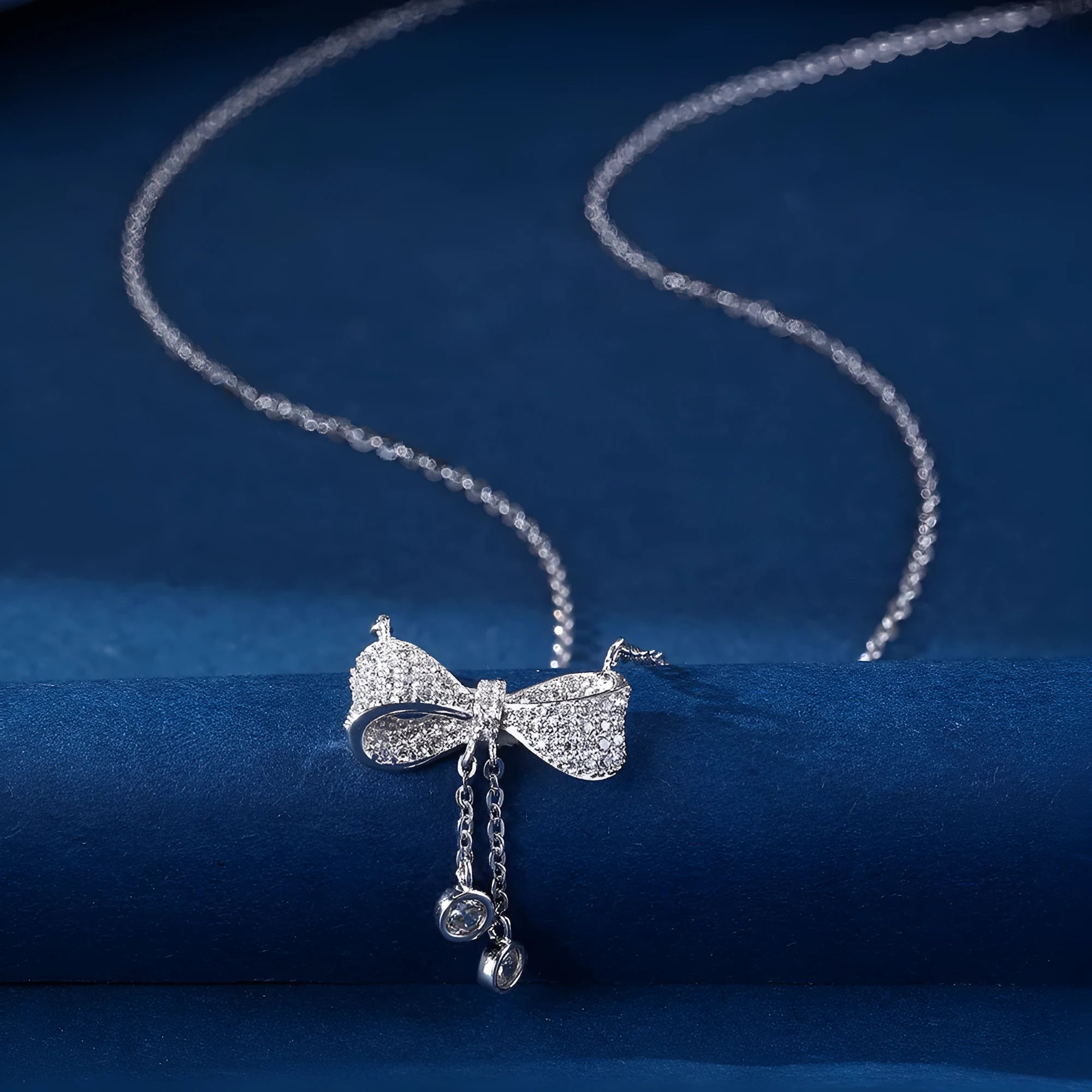 S925 sterling silver bow pendant necklace on O-ring chain, silver colour