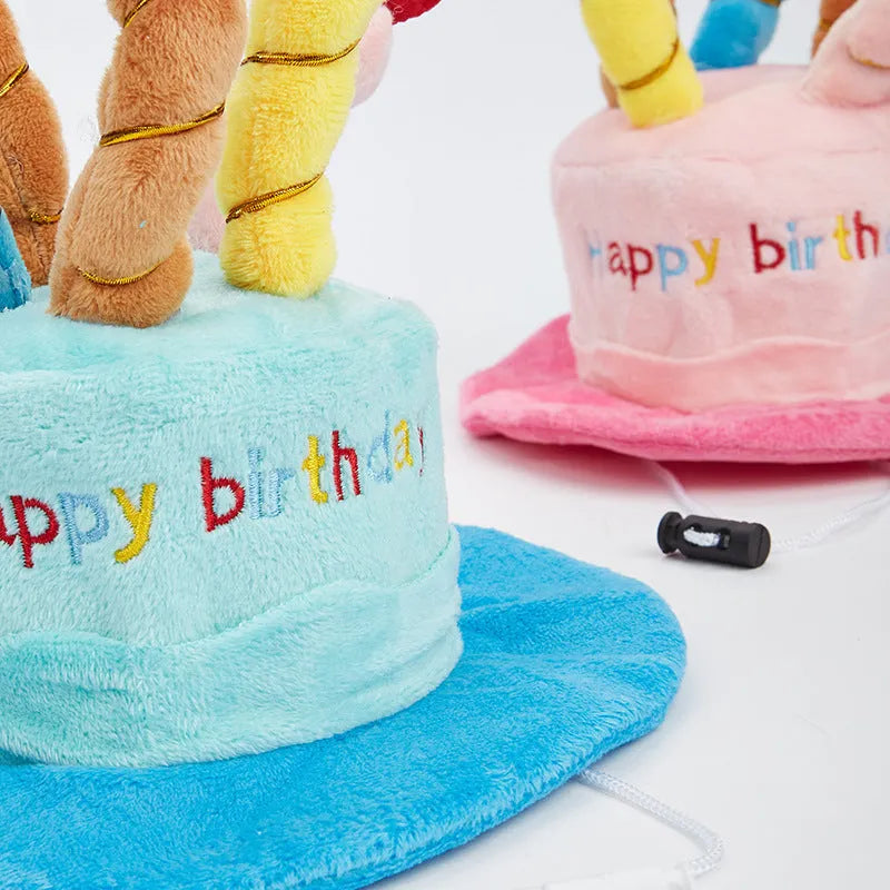 Blue or pink polyester dog birthday hat accessory measuring 21cm by 15cm by 6.5cm
