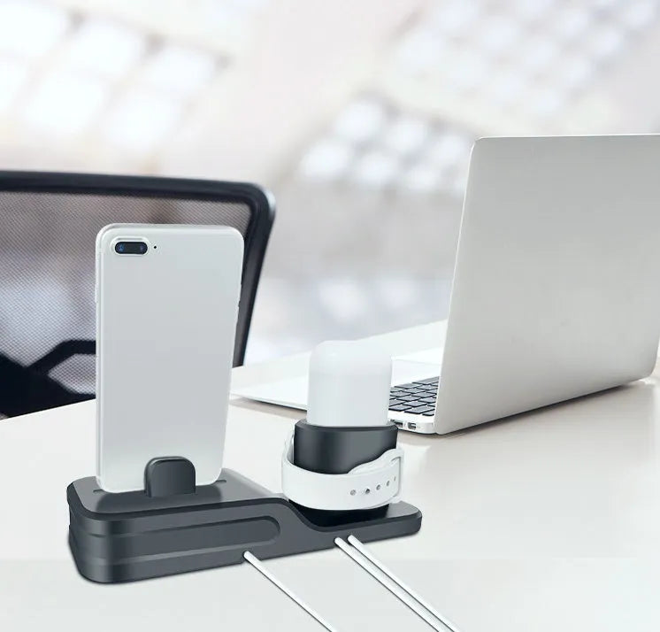 Black geometric 3-in-1 charging station for Apple devices showing iPhone, iwatch and AirPods charging slots