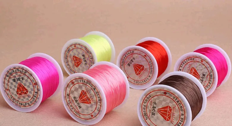 Elastic wire chain rubber beading cord for bracelets and necklaces, shown in assorted colours