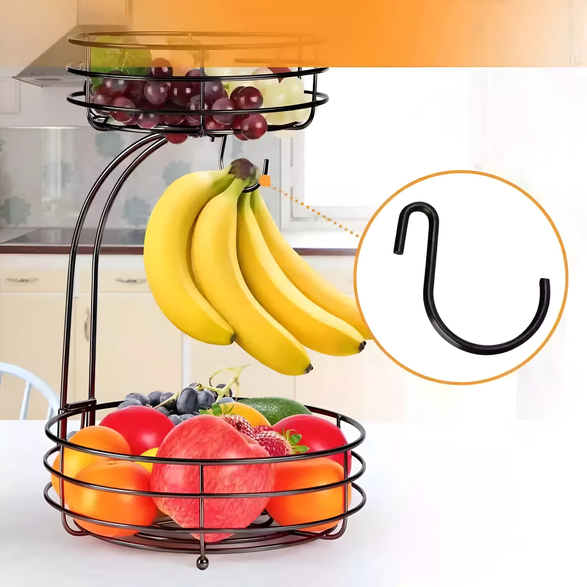 Double-layer black and gold wrought iron fruit basket for kitchen or restaurant storage.