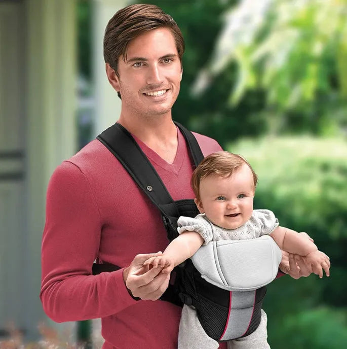 Blue double-shoulder baby carrier showing face-to-face carrying position with breathable fabric