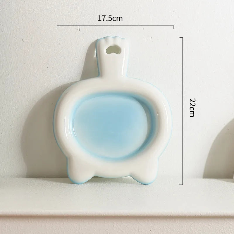 Ceramic cat bowl with shallow design in selected colour showing curved edges for spillage reduction
