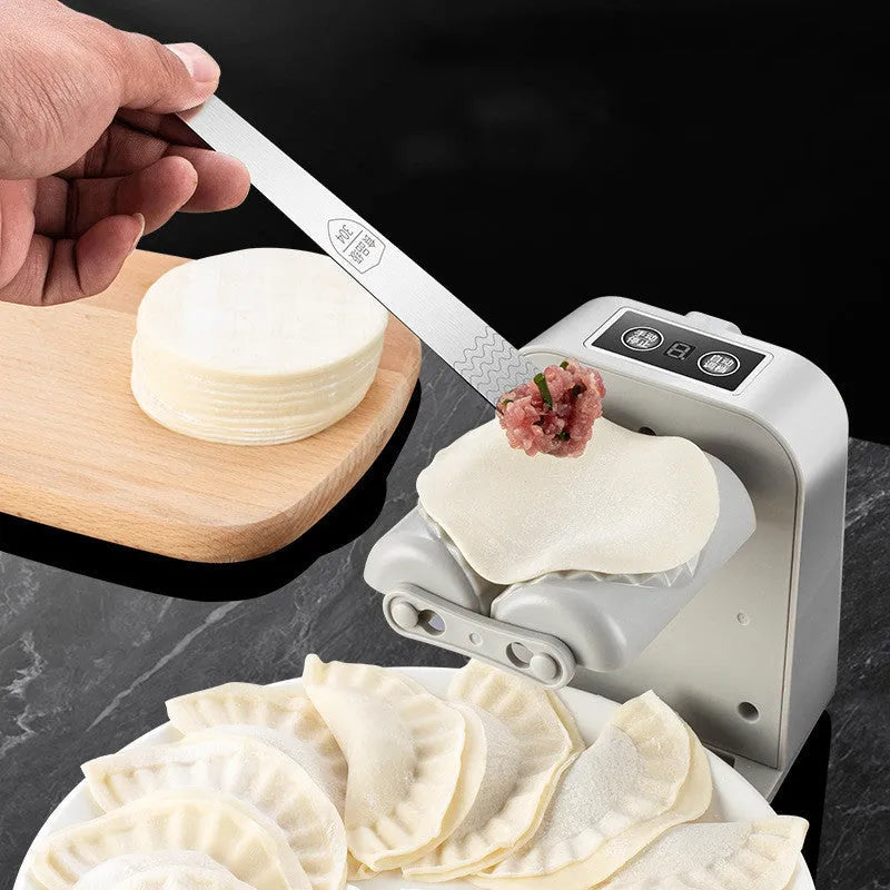White electric automatic dumpling maker machine with USB charging cable and accessories