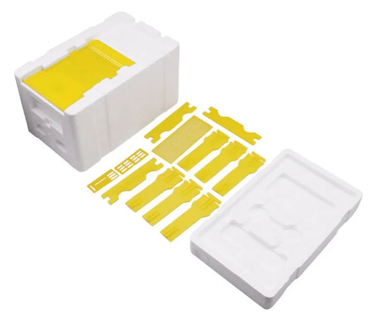 Three white EPS foam bee delivery boxes for beehive breeding and colony management.