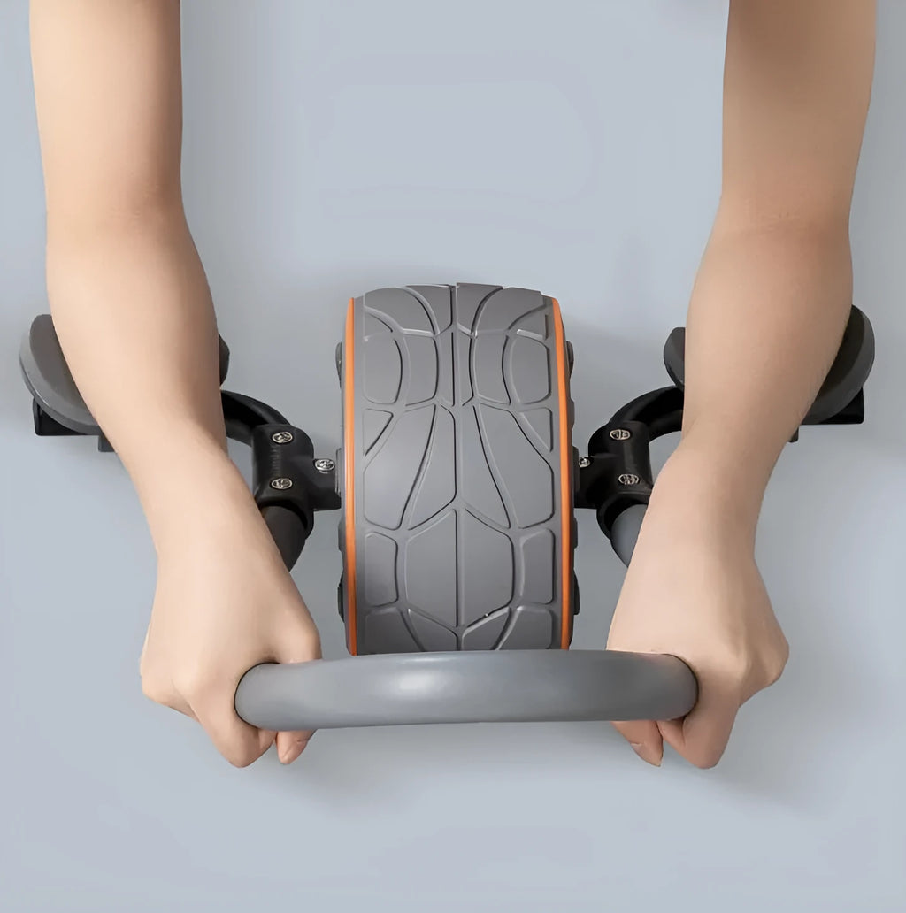 Shadow grey abdominal wheel with dual wheels and TPR construction, 42.5x18cm, on a carpet with kneeling mat