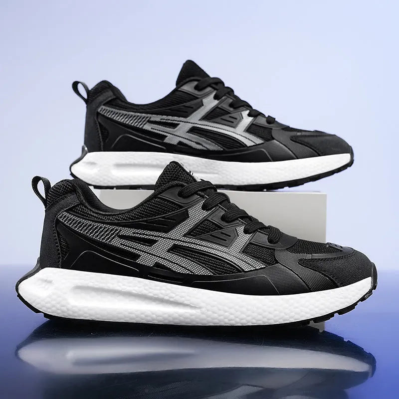 Casual non-slip popcorn shock absorption sneaker with KPU network upper in white, black, or light gray.