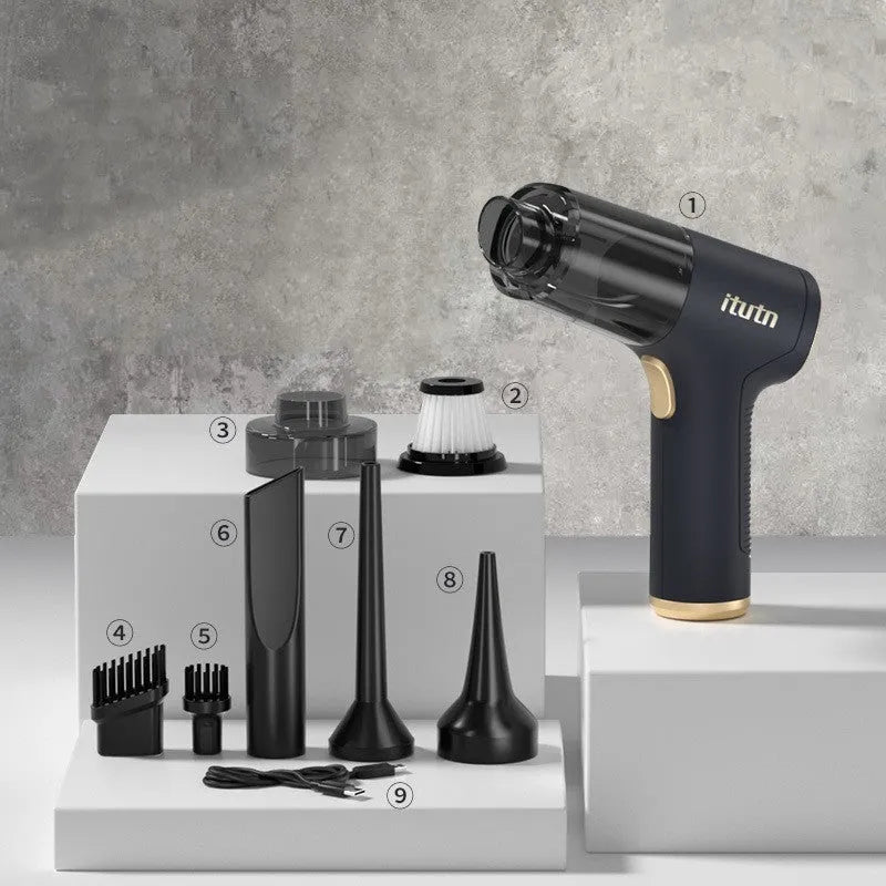 Black wireless handheld car vacuum cleaner with attachments including brushes and nozzles.