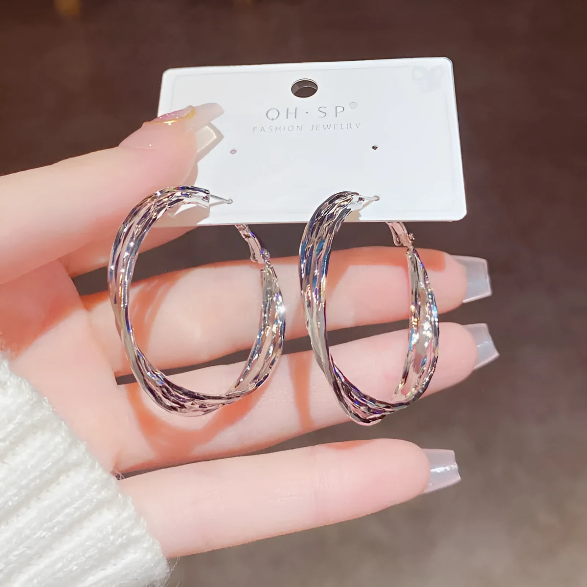 Simple metal twisted earrings for women, copper geometric round shape, available in gold or silver finish