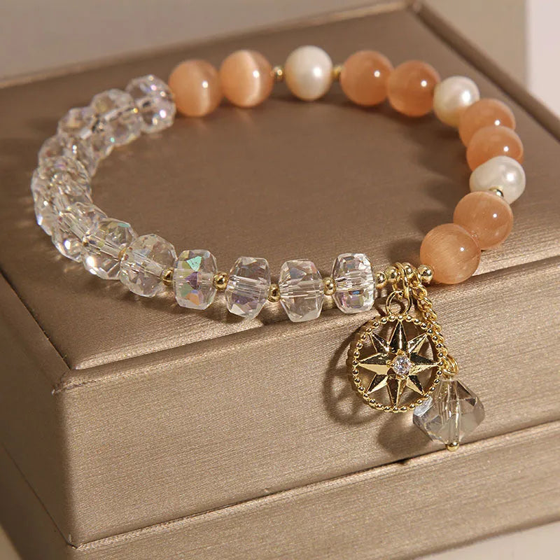Orange women's bracelet with eight Awn star design and gold-plated inlaid stone.