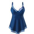 Plus size woman in a blue two-piece quick-dry bikini swimsuit at the poolside.