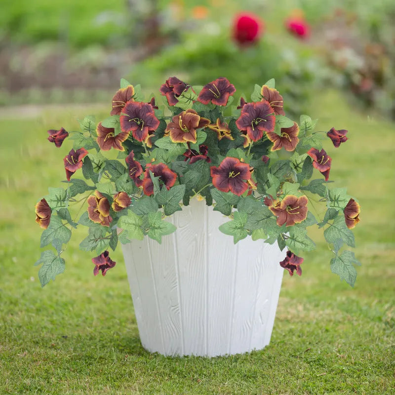 Plastic artificial flower container with 12 ground forks in courtyard garden setting