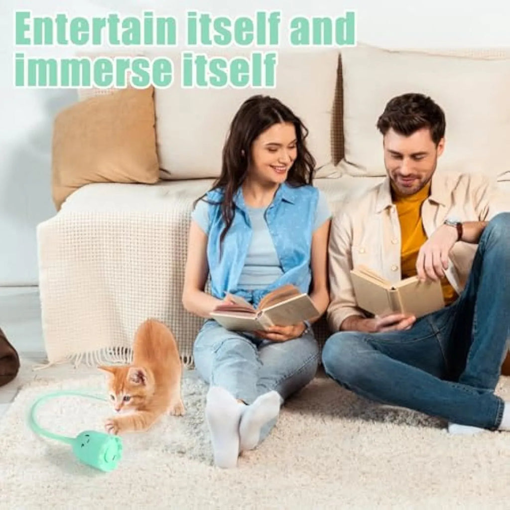 Green rechargeable automatic cat wand toy with swinging silicone tail on a white background.