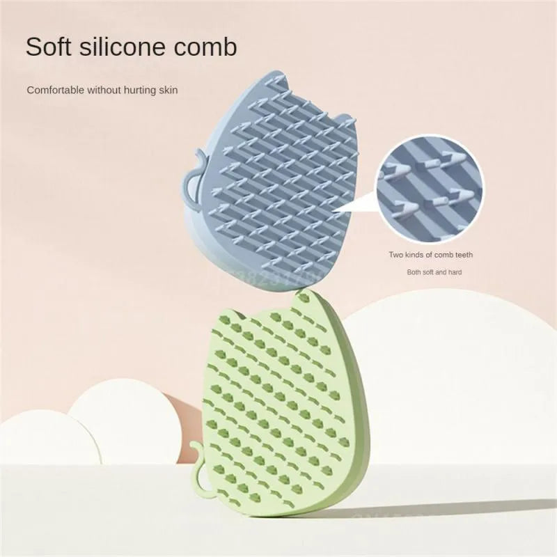 Brown sponge silicone pet hair removal brush with comb teeth on a wooden surface