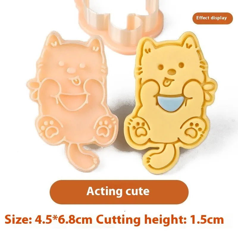 Plastic cartoon biscuit mould showing three-dimensional pet puppy designs including one with a birthday hat