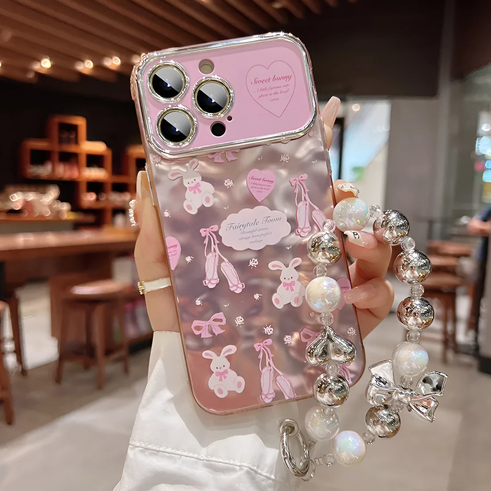 Pink frosted rabbit print silicone phone case with wristband lanyard for iPhone