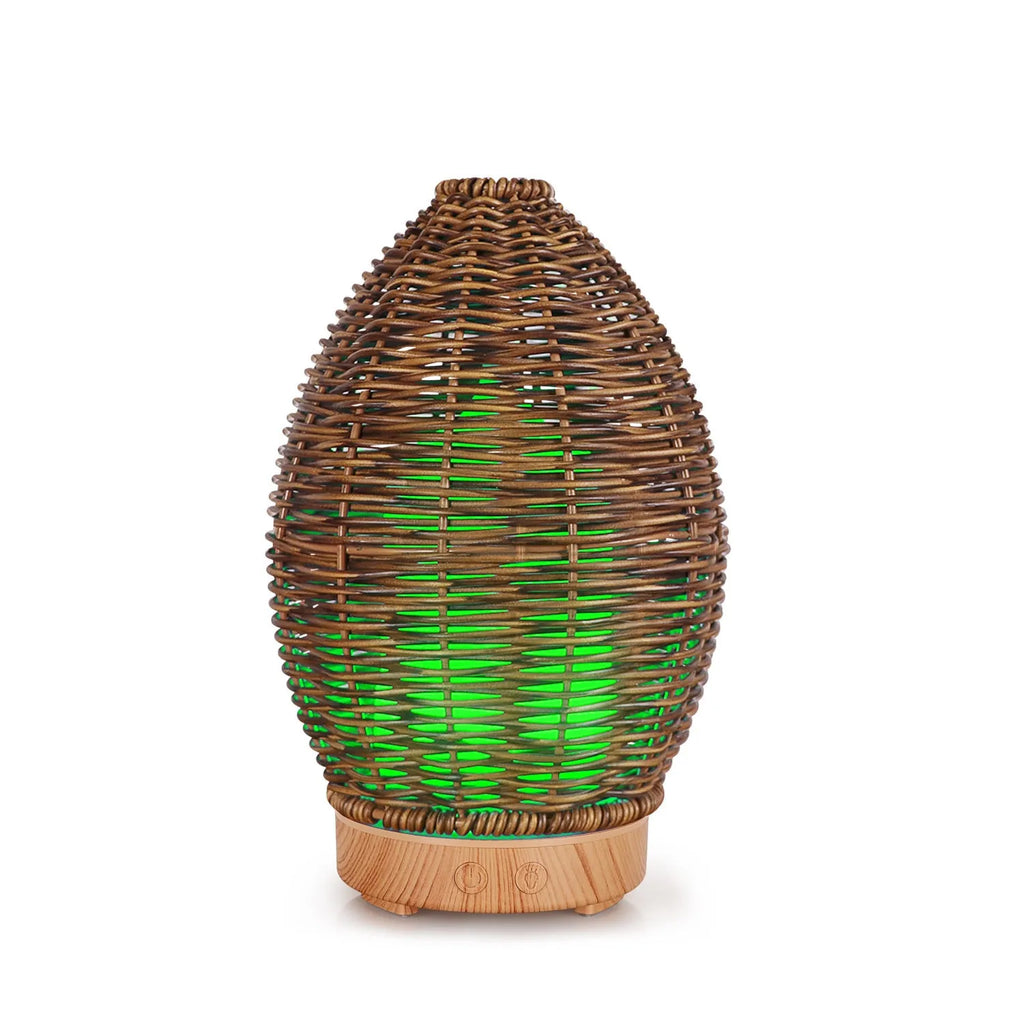 Hollow rattan aroma diffuser with light wood grain base showing 100ml capacity ultrasonic unit