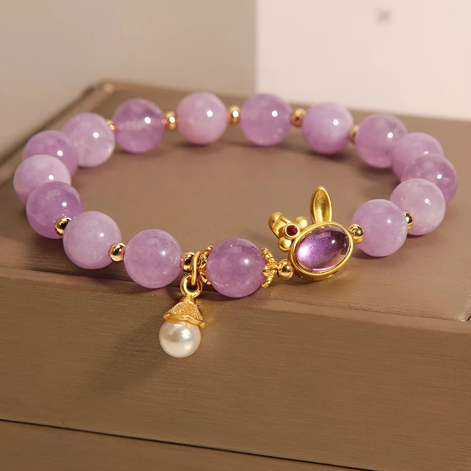 Mori style crystal bracelet with purplish red jade hare head design