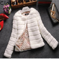 Women's short 40cm faux fur top in beige on a model.
