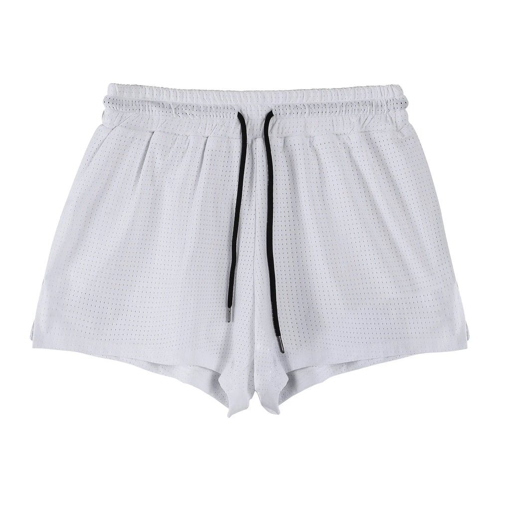 A pair of men's black quick-drying nylon shorts with a mid waist, laid flat.