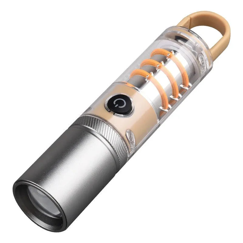 Orange 10W LED flashlight with dual light source, optical zoom, and USB charging cable