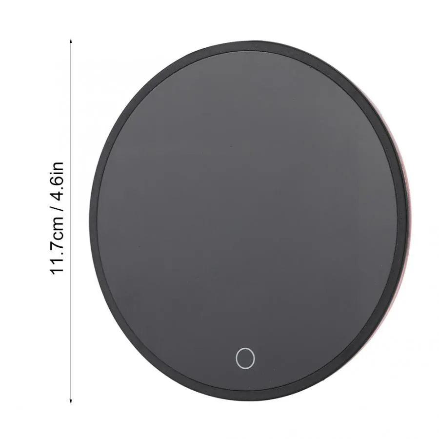 Electric waterproof cup warmer with digital display and touch switch on desk next to a mug of tea