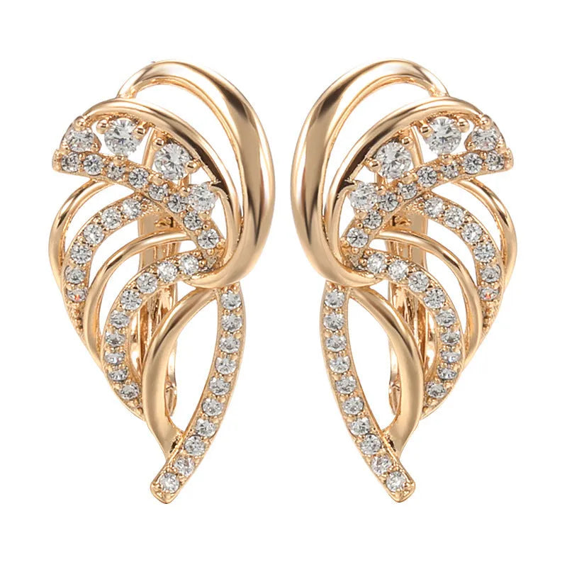 Women's copper ear clips with wing design featuring micro inlaid zircon detailing and gold-plated finish in H0195 colour