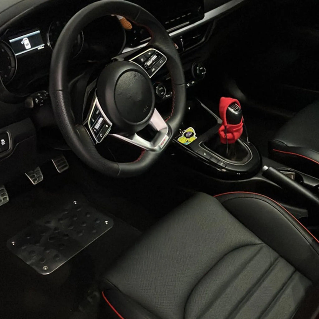 Universal 12cm pure cotton gear knob cover in hoodie style with adjustable drawcord, shown in black