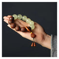 Rosewood bracelet with carved Fu character in amass fortunes colour on flexible 20mm ring