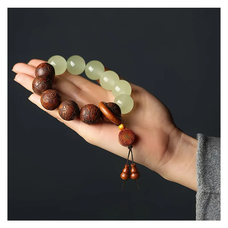 Rosewood bracelet with carved Fu character in amass fortunes colour on flexible 20mm ring