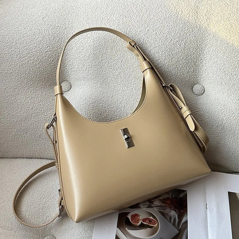 Genuine cowhide leather crossbody shoulder bag in dumpling shape with sandwich pocket and six colour options