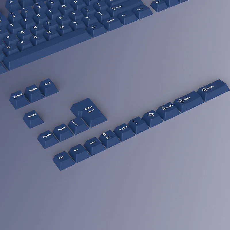 PBT two-tone blue key cap set with carved height profile, measuring 27cm x 17cm x 3cm
