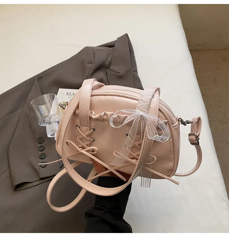 Milky White women's casual shoulder handbag with a bandage bow and sewing thread detail.