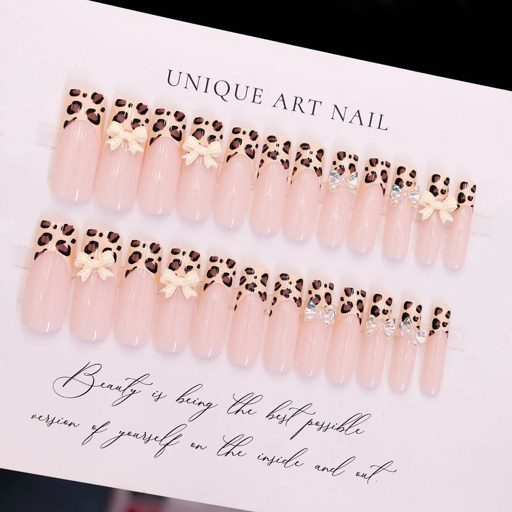Leopard print butterfly false nail set with WM296 colour designs for press-on manicure application