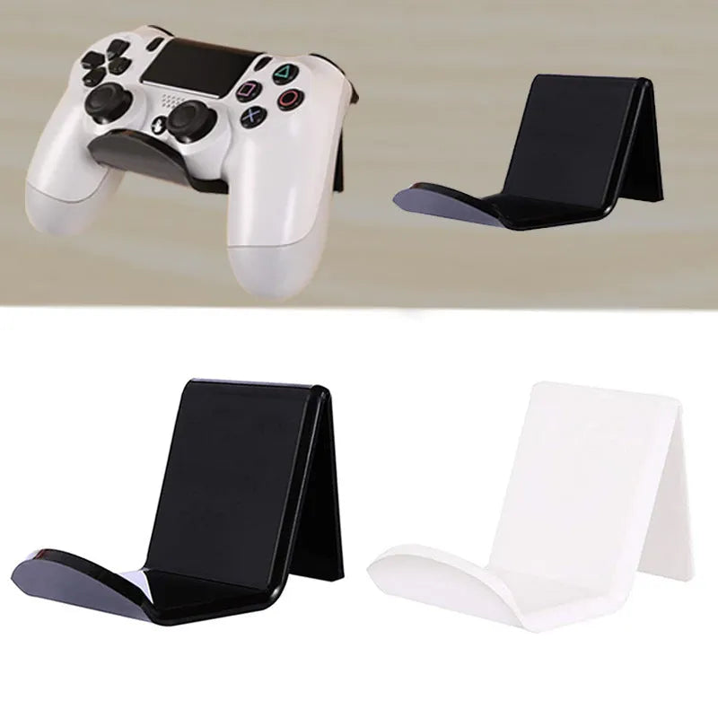 Universal game controller wall mount bracket in black colour shown mounted on wall