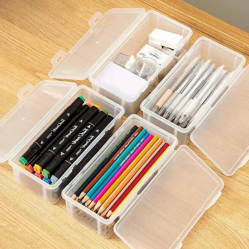 Clear plastic pencil storage box filled with colouring pencils and wax crayons.